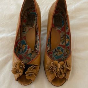 Mustard leather peep toe heels from Anthropologie